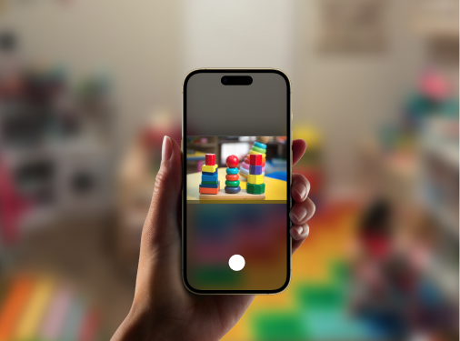Taking a photo and tapping a card on a Point2Picture communication board